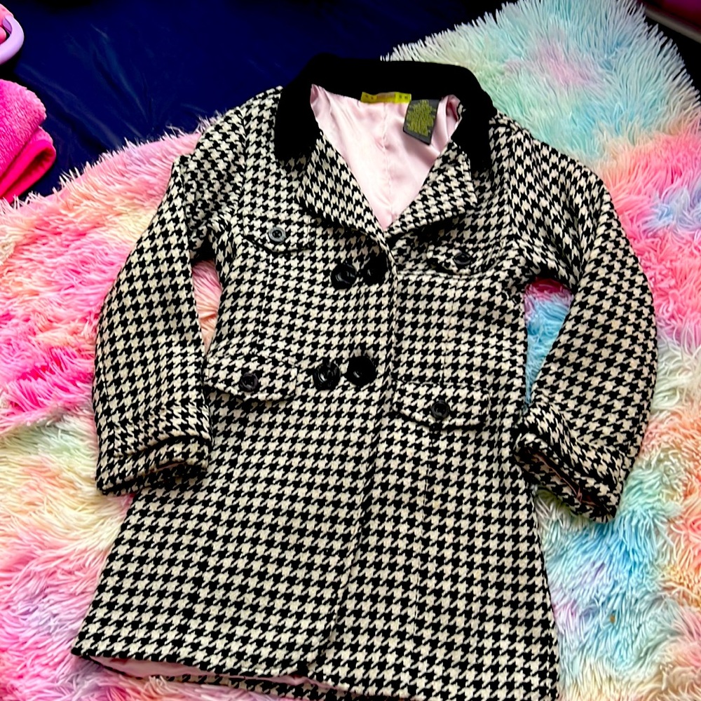 Black white and pink inside over coat